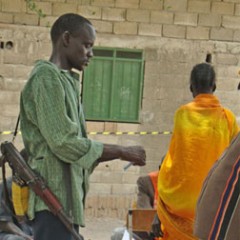 Sudan_Apr-14-Rubkona-Pakur-PS-Security-folding-ballot-paper-for-voter_thumb-240x240 