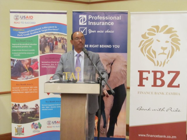 Tassew Mekuria, Director of Creative's Read to Succeed project in Zambia, addresses the audience at the breakfast ceremony announcing the expansion of Reading Tools in a Box.