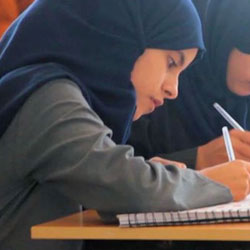 Libya Girl writing