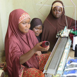 Nigerian women sewing.
