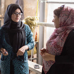 Afghani women talking.