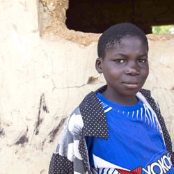 Young boy in Nigeria looking at camera.