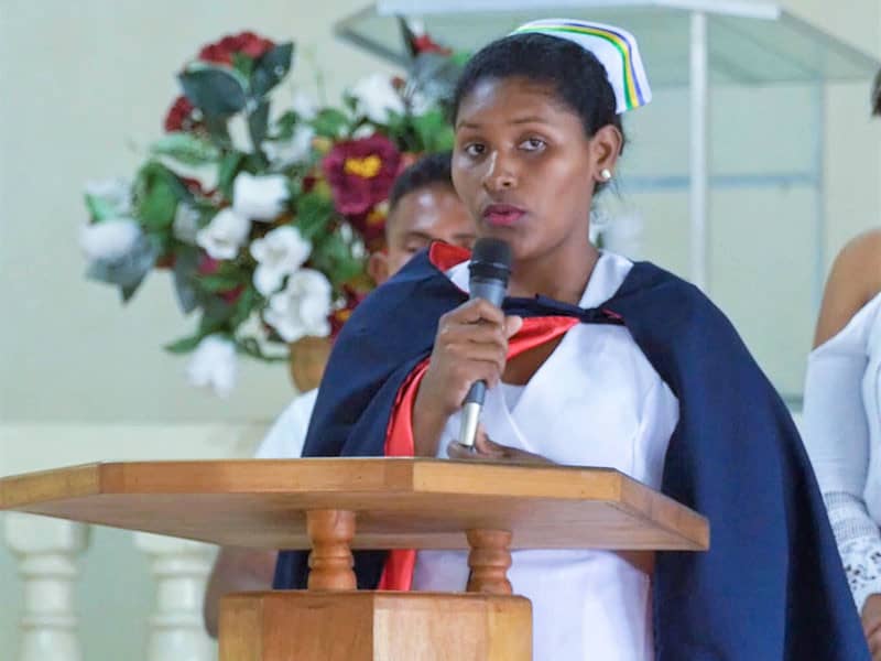 Eda Masantos speaks at her graduation.