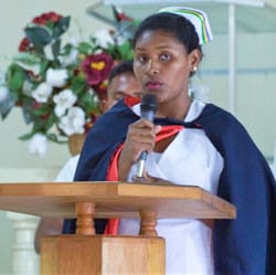 Eda Masantos speaks at her graduation.