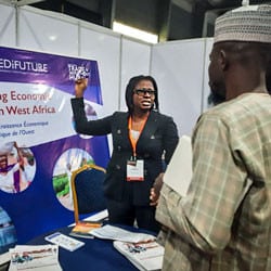 woman explains at West Africa Trade event