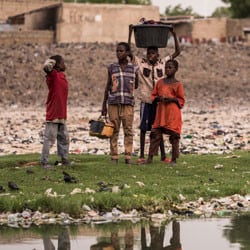 A group of children near a river in Maiduguri, Nigeria.