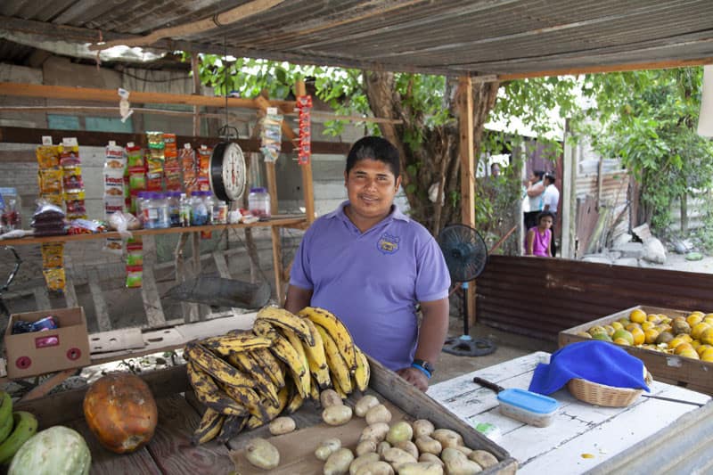 A Honduran man at his shop.